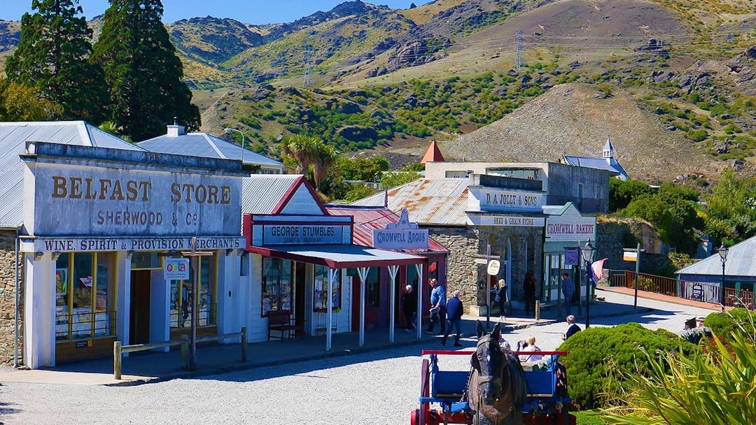 Historic street with shops in Cromwell, New Zealand, part of a gourmet food and wine tour from Queenstown.