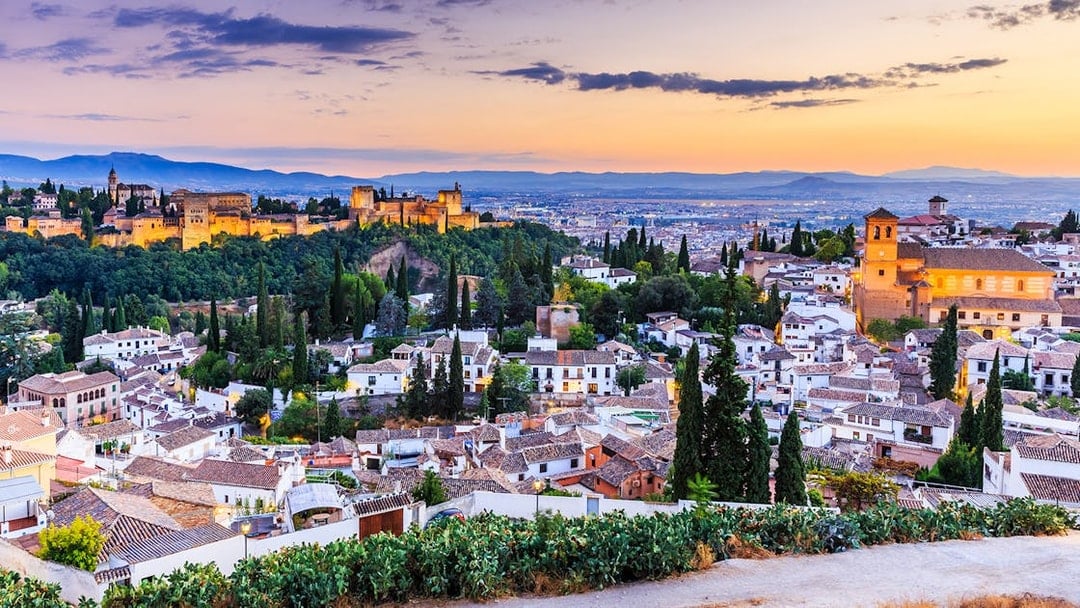 Alhambra and Granada cityscape at sunset, view from Albaicín.