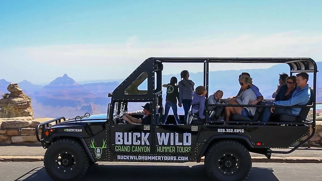 Hummer driving on a trail with tourists at the Grand Canyon during the Grand Kingdom Tour in Las Vegas.