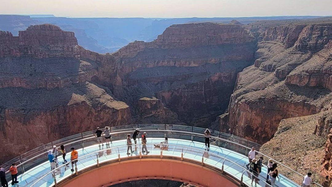 Guests on the Skywalk overlooking the Grand Canyon West Rim, Arizona, USA.
