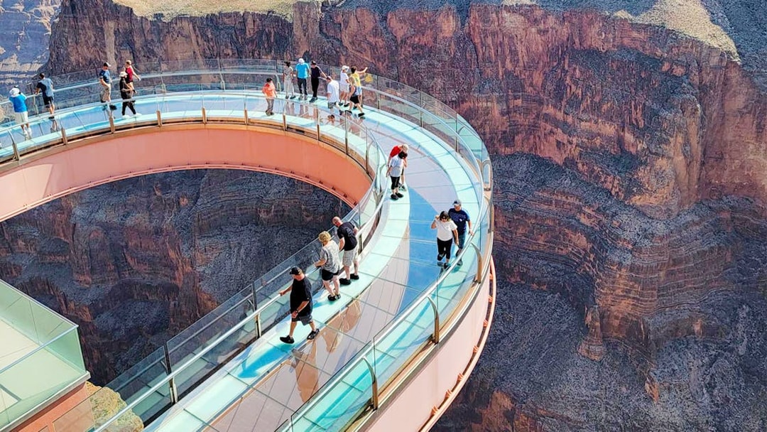 Visitors on the Skywalk overlooking the Grand Canyon West Rim, Arizona, USA.