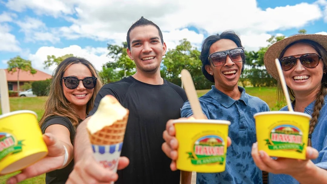 Friends enjoying ice cream during Oahu's Grand Circle tour.