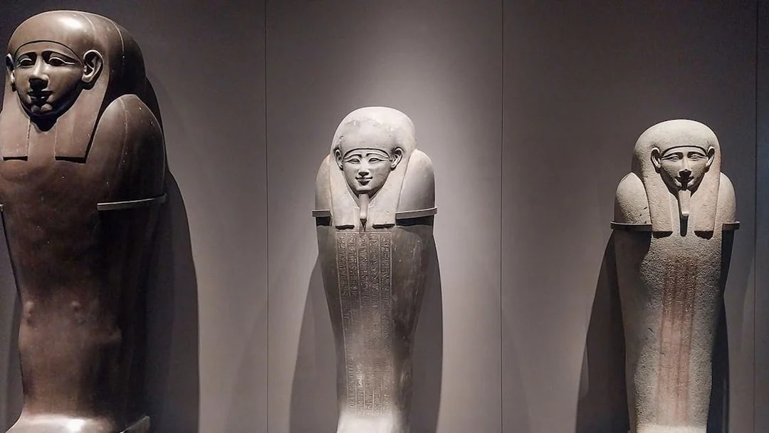 Ancient Egyptian sarcophagi on display at the Grand Egyptian Museum.