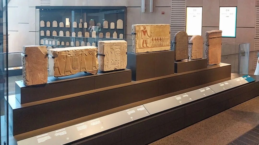 Ancient Egyptian artifacts displayed at the Grand Egyptian Museum.