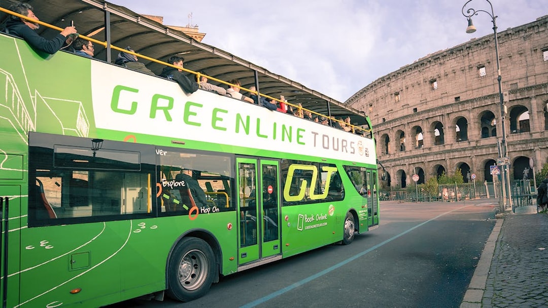Green Line hop-on hop-off bus near the Colosseum in Rome.