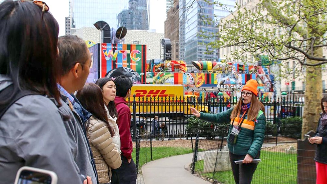 Visitors on a guided tour at the 9/11 Memorial, New York City.