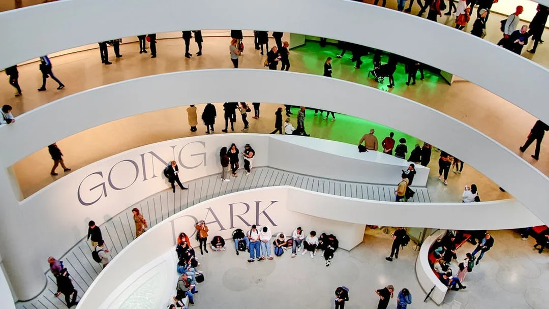 Visitors inside the Guggenheim Museum's spiral walkway, New York City.