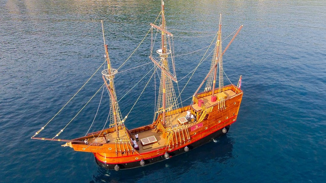Wooden ship sailing on the Adriatic Sea during Elaphite Islands cruise.