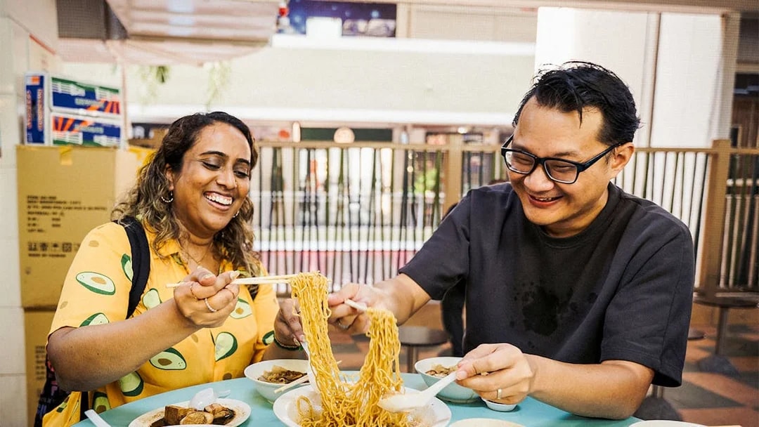 People enjoying ramen at a Michelin-rated restaurant.