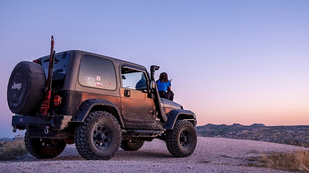 Guided off-road Jeep tour in Cappadocia at sunset with scenic views.