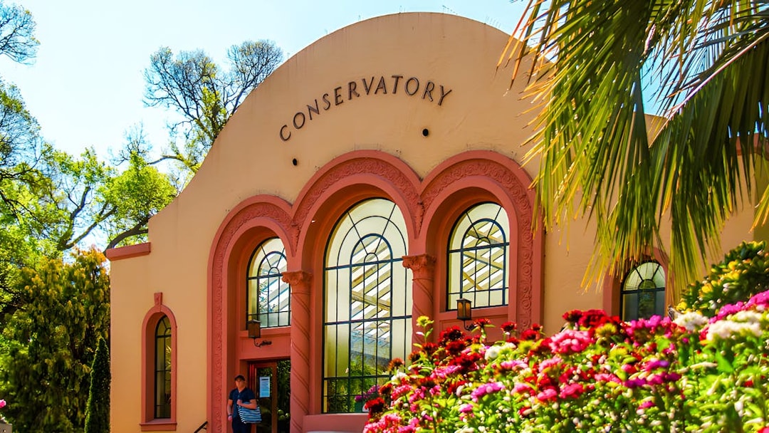 Conservatory entrance with floral display, Fitzroy Gardens, Melbourne.