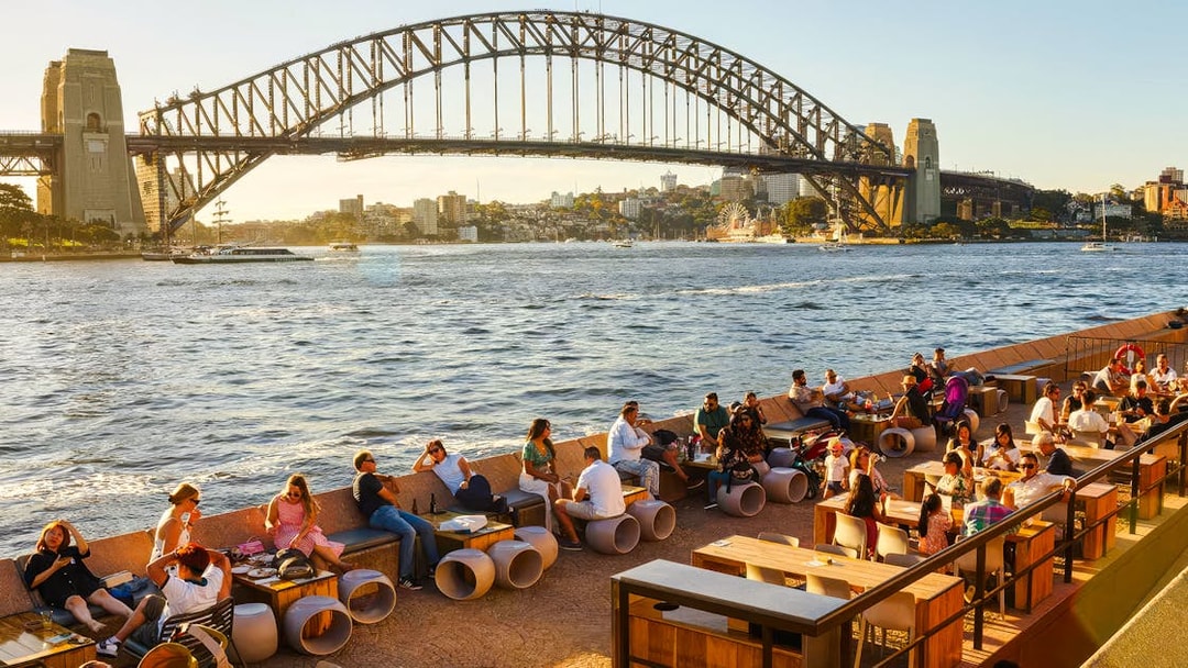 House Canteen patrons dining with Sydney Harbour Bridge view.