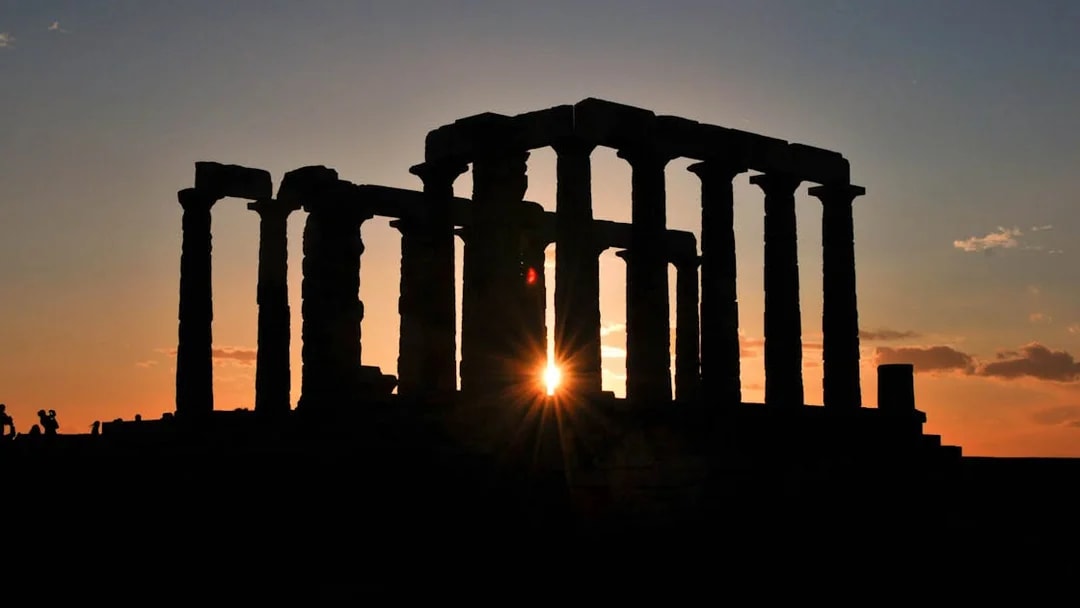 Temple of Poseidon at sunset, Cape Sounion, viewed from Athens tour.