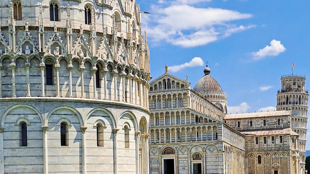 Pisa Cathedral and Leaning Tower on a sunny day during a guided walking tour.