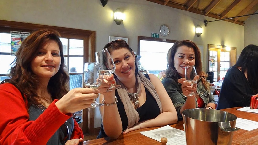 Women enjoying a wine tasting at a Hunter Valley winery.