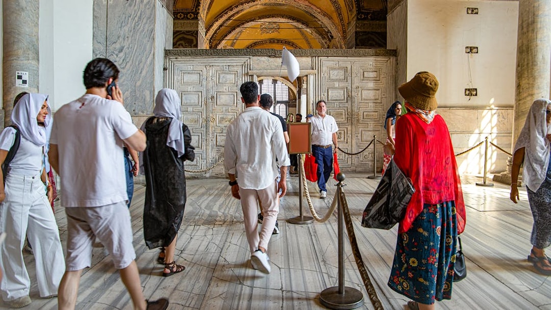Visitors on a guided tour inside Hagia Sophia, Istanbul.