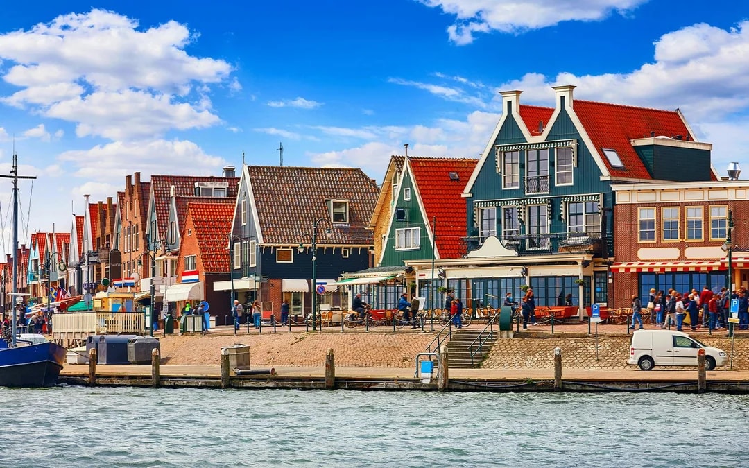 Colorful Dutch houses along the waterfront in Volendam, Netherlands.