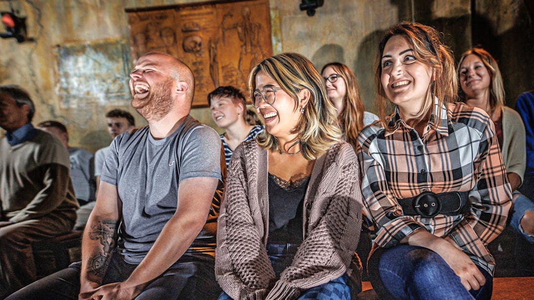 Visitors enjoying a show at Hamburg Dungeon.