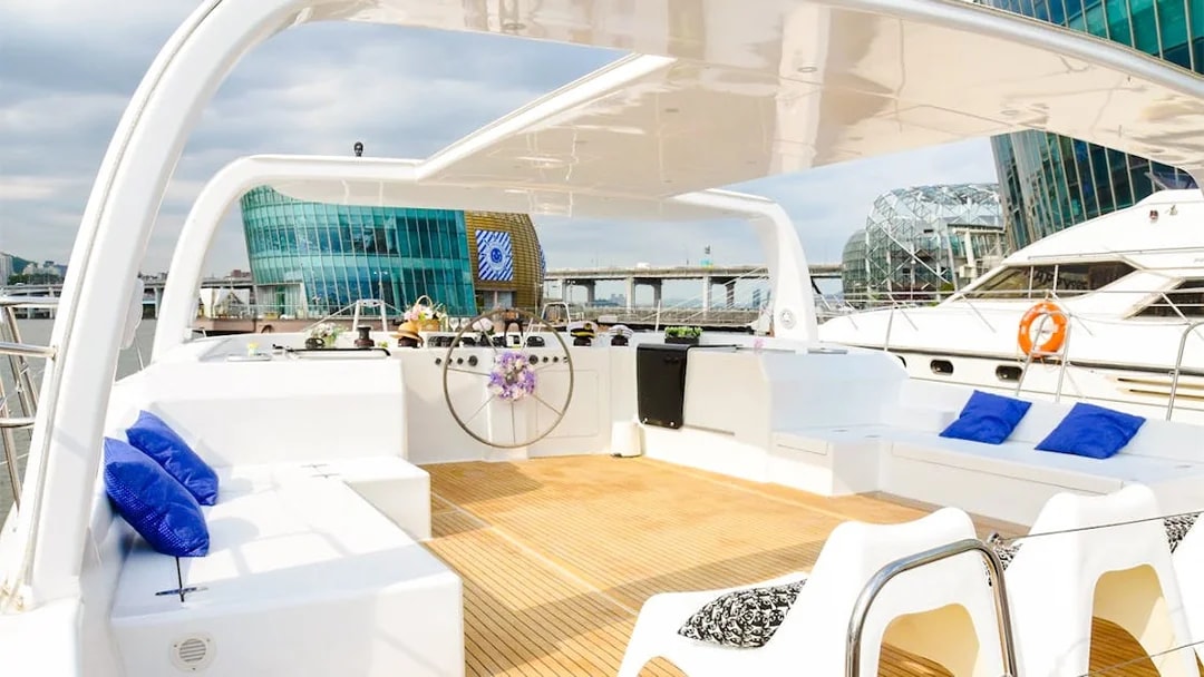 Yacht deck with seating on Han River cruise, Seoul.