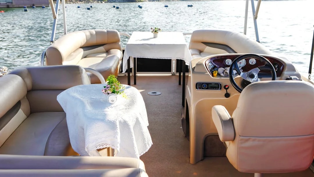 Yacht interior with seating and table on Han River cruise, Seoul.