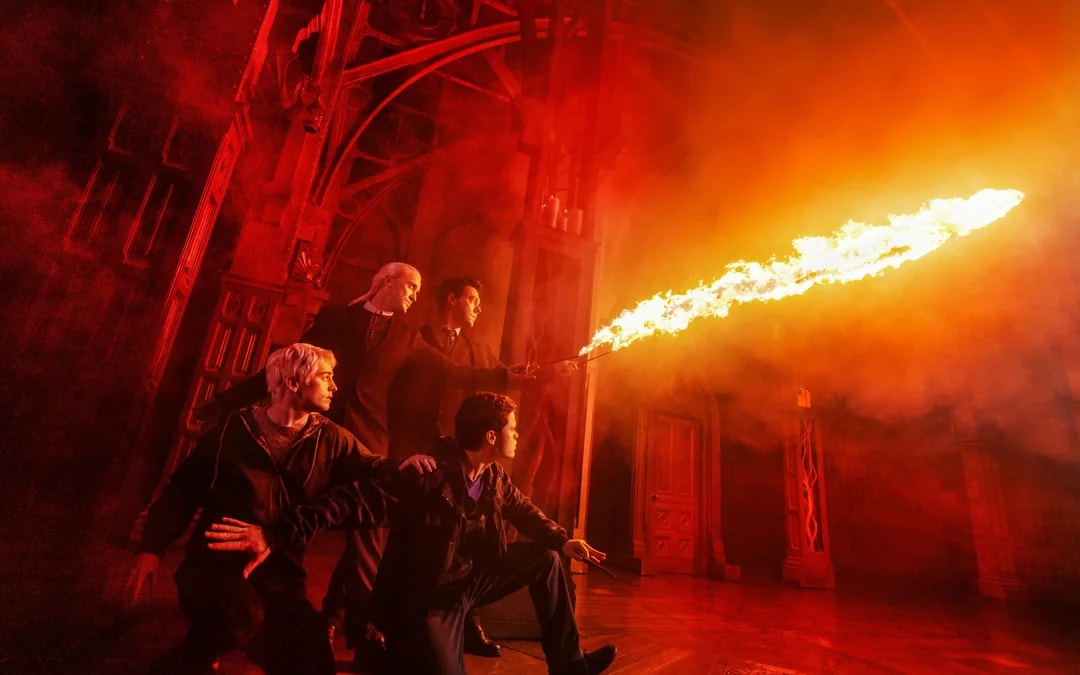 Stage scene from Harry Potter and the Cursed Child on Broadway with characters casting a spell.