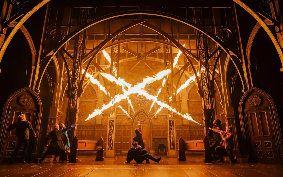 Stage scene from Harry Potter and the Cursed Child on Broadway with actors casting spells.