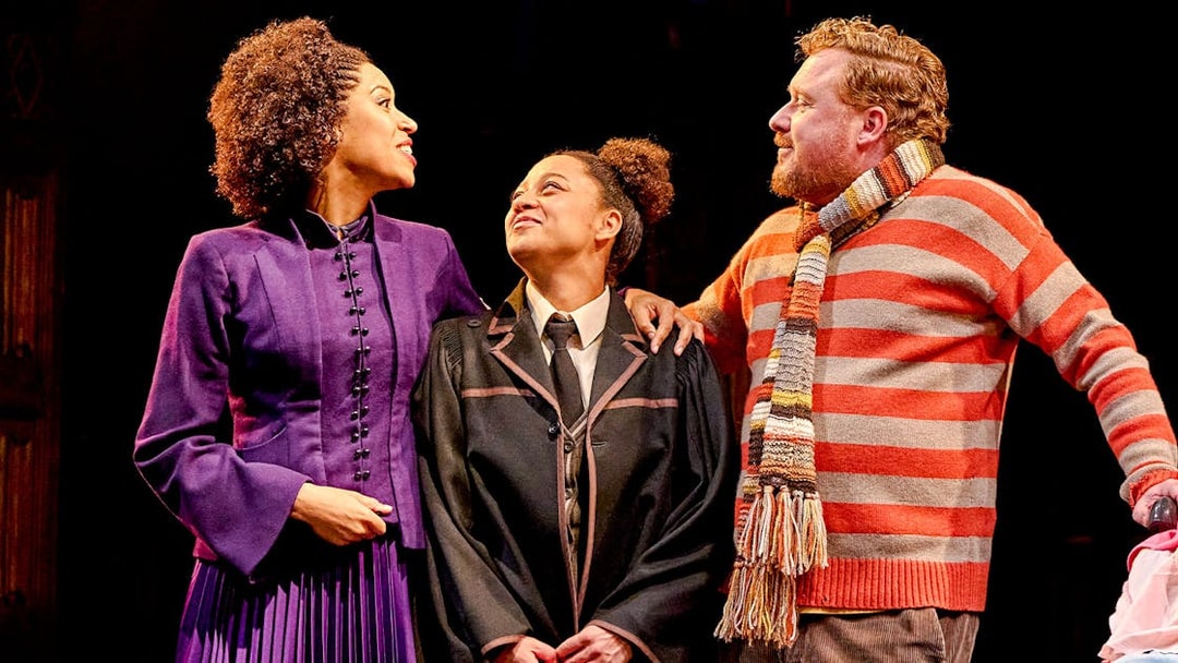 Actors in costume on stage during "Harry Potter and the Cursed Child" performance.