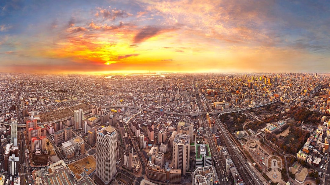 Aerial view of Osaka cityscape at sunset from Harukas 300 Observatory.