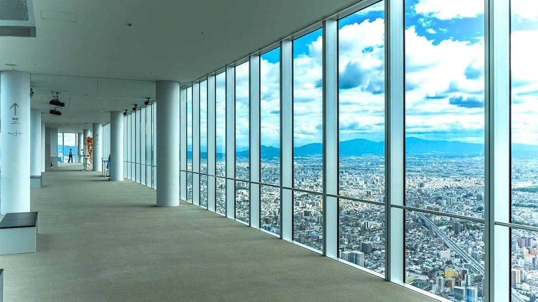 Harukas 300 Observatory interior with panoramic view of Osaka city.