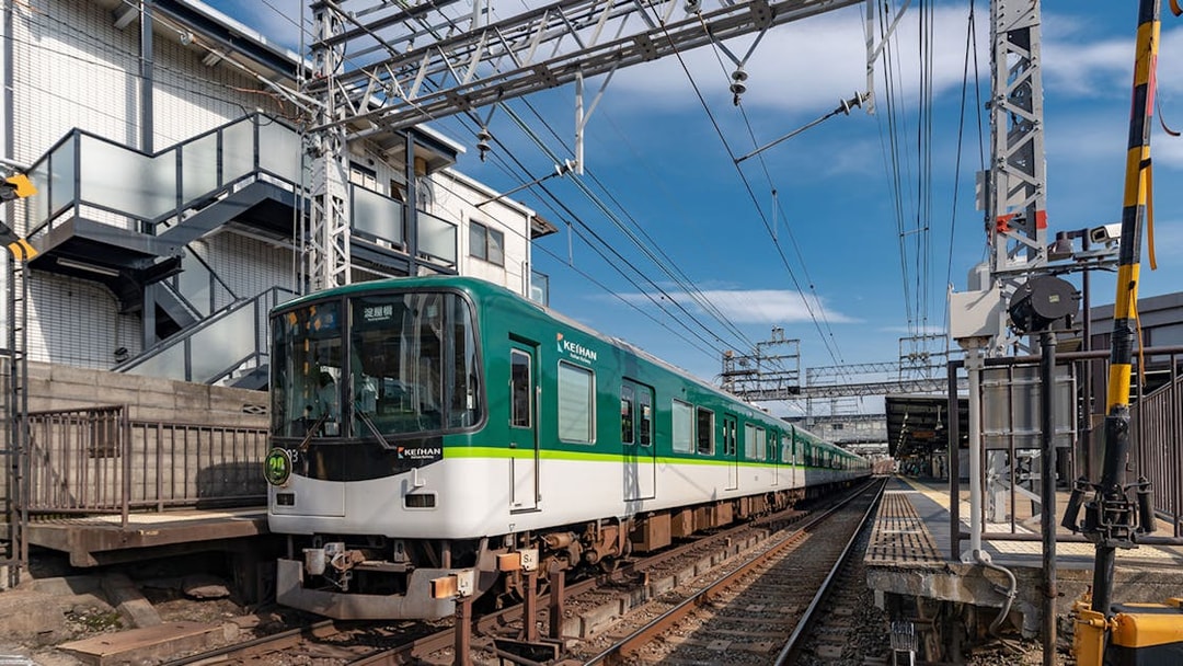 Kansai train at station under blue sky, part of Have Fun in Kansai 1 Week Pass.