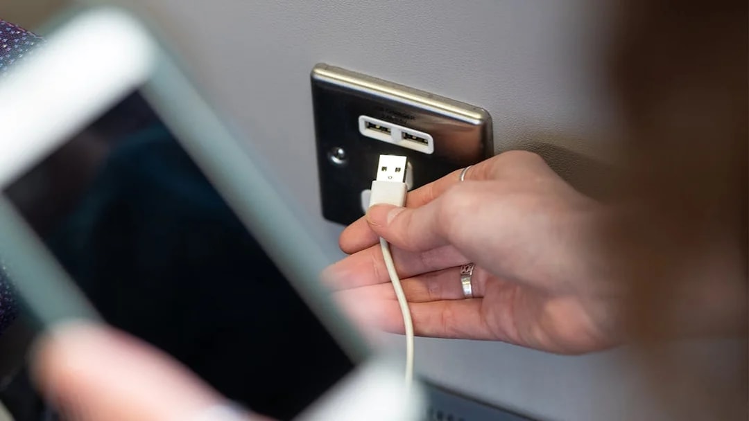 USB charging socket on Heathrow Express train.