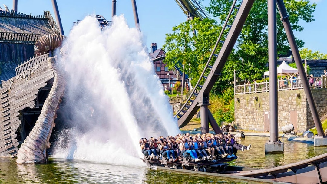 Roller coaster splashing into water at Heide Park, Germany.