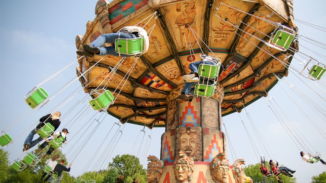 Swing ride at Heide Park with people enjoying the attraction.