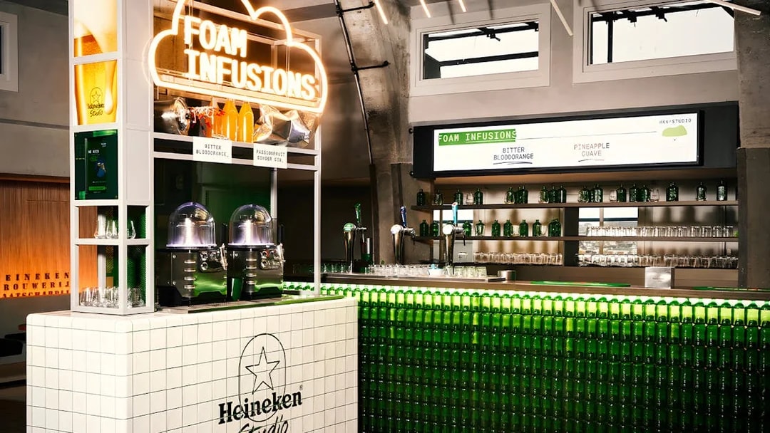 Heineken Experience bar with foam infusions display in Amsterdam.
