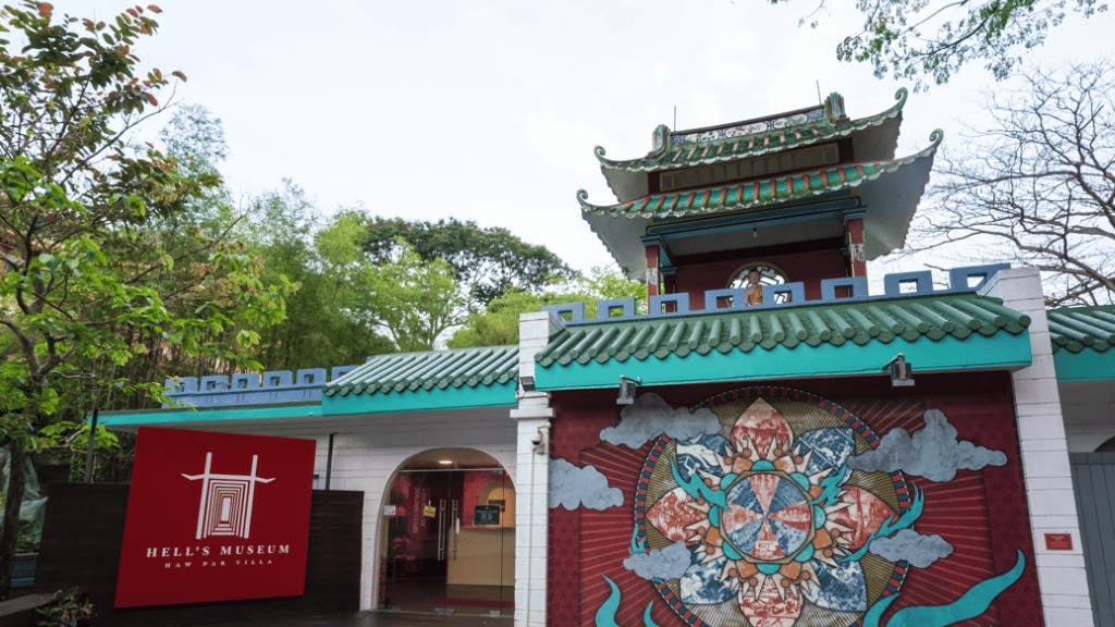 Main entrance to Hell's Museum at Haw Par Villa, Singapore, featuring a distinct mural.