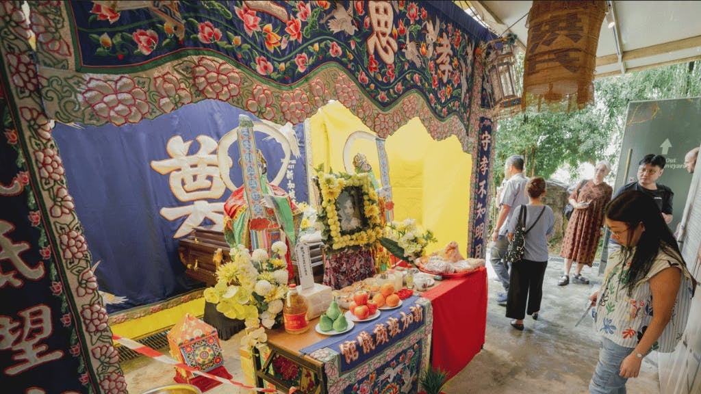 Traditional Chinese funeral display with offerings at Hell's Museum, Singapore.