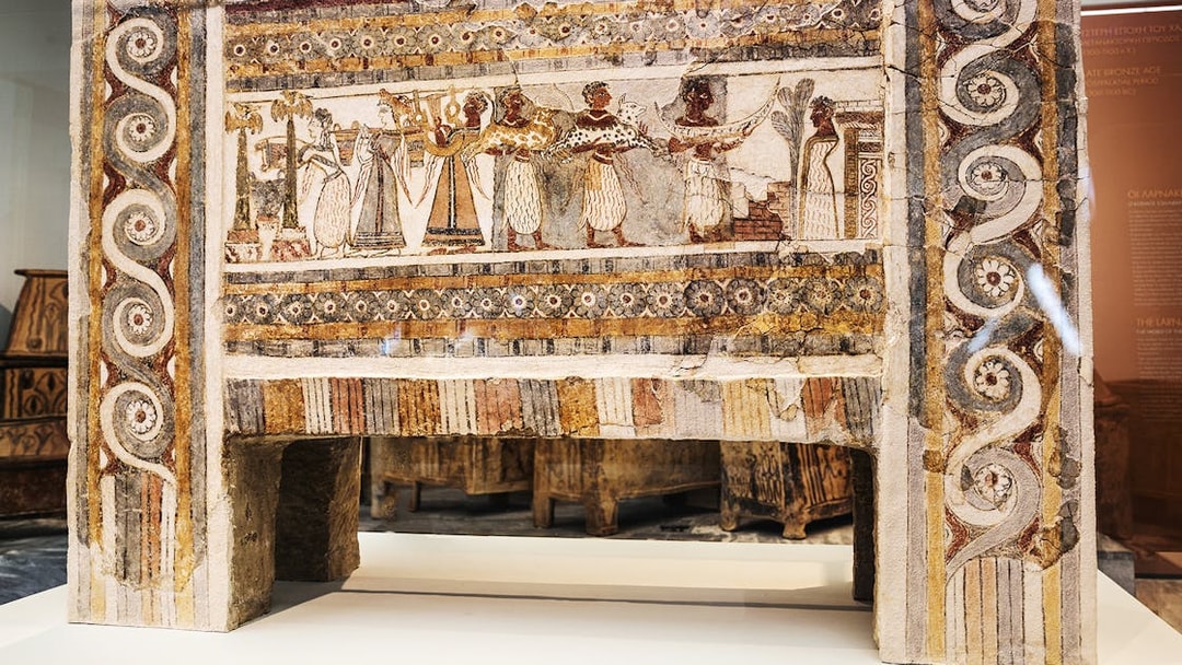 Minoan fresco with ceremonial scene at Heraklion Archaeological Museum.