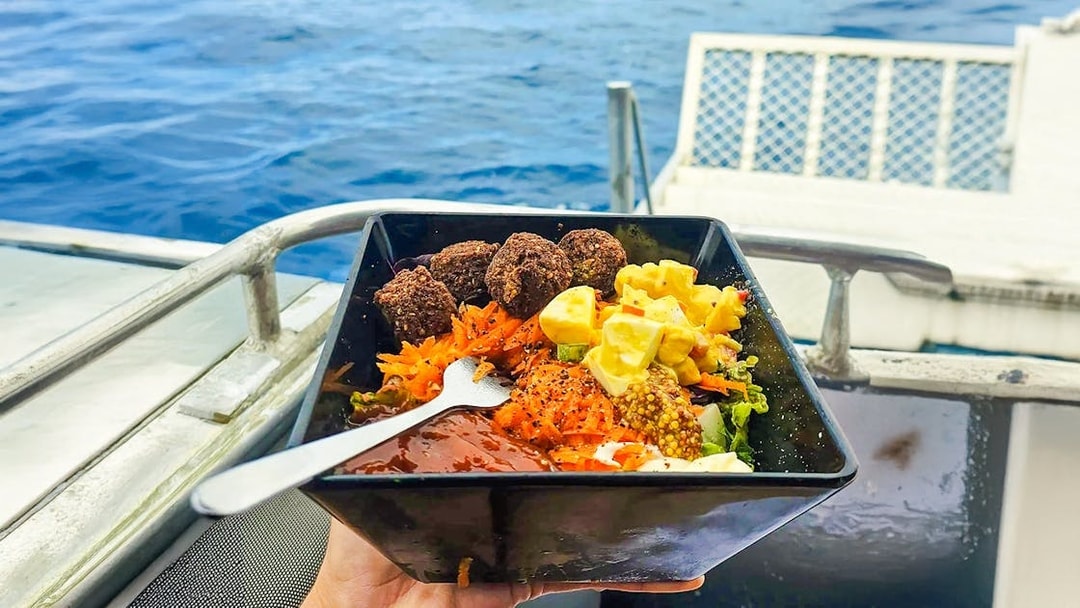 Lunch served on a boat near Fraser Island with ocean view.