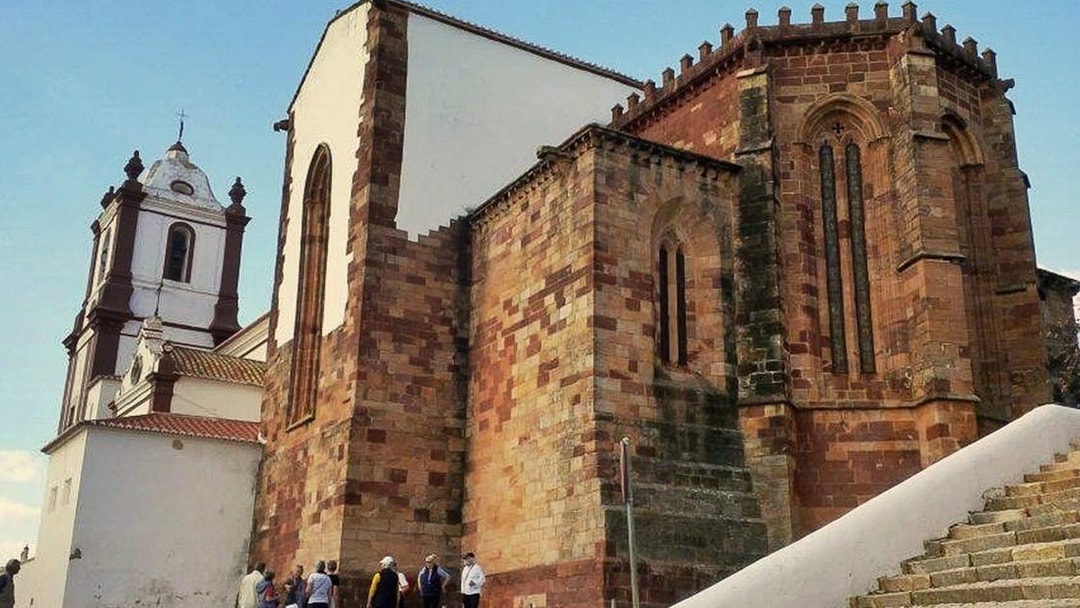 Historic church with tourists in Silves, Western Algarve.