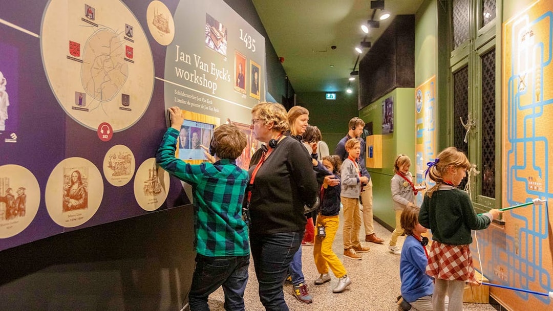 Guests exploring interactive exhibits at Historium Bruges.