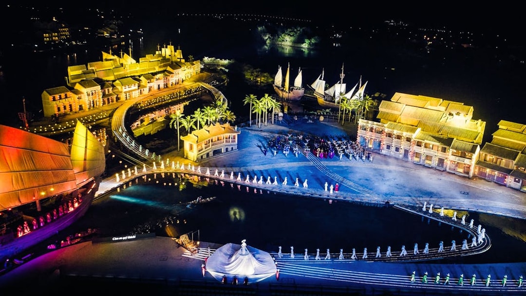 Aerial view of Hoi An Memories Show with illuminated stage and performers, Vietnam.
