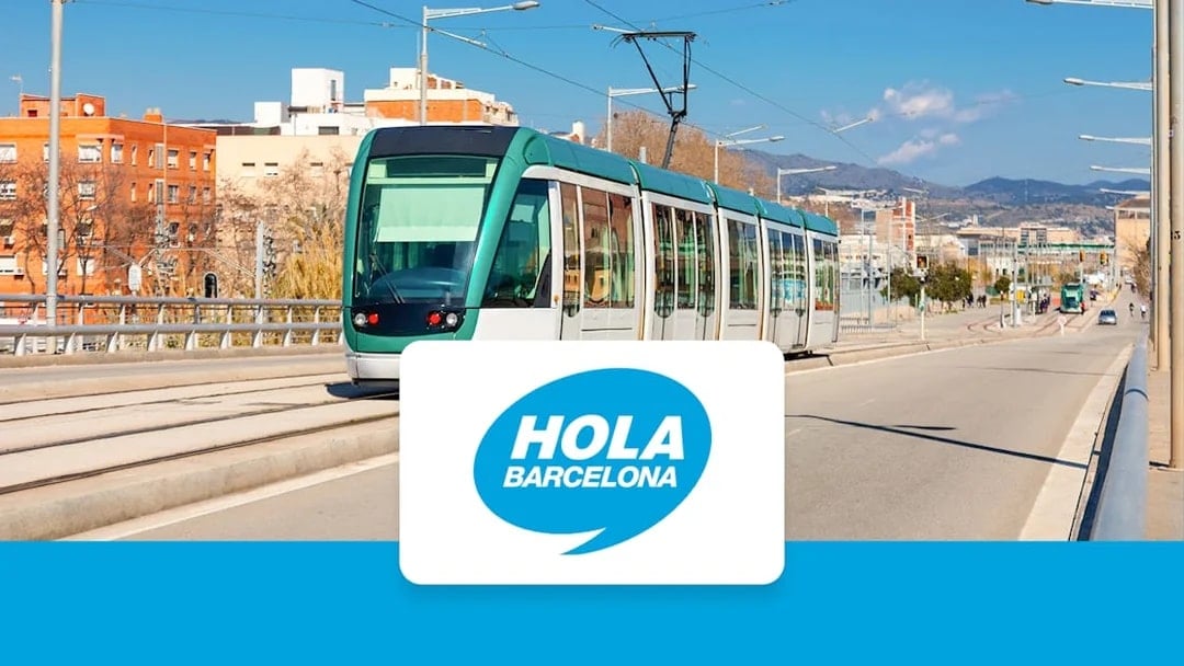 Barcelona tram on city street with Hola Barcelona pass logo.