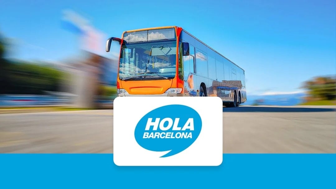 Barcelona city tour bus with Hola Barcelona logo.