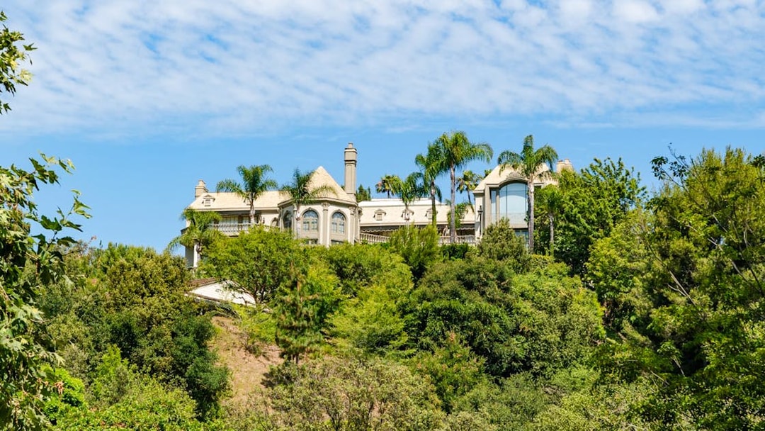 Luxury home surrounded by trees in Hollywood Hills, Los Angeles, California.