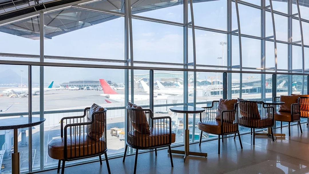 Seating area with airport view at Plaza Premium Lounge.