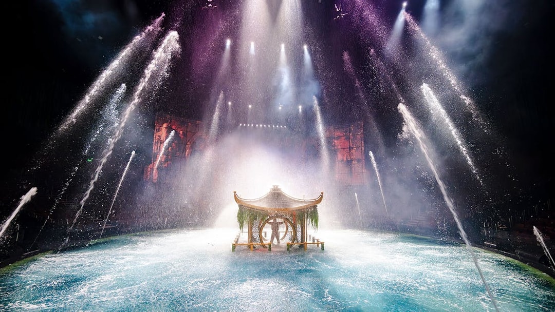 House of Dancing Water performance with water jets and illuminated stage.