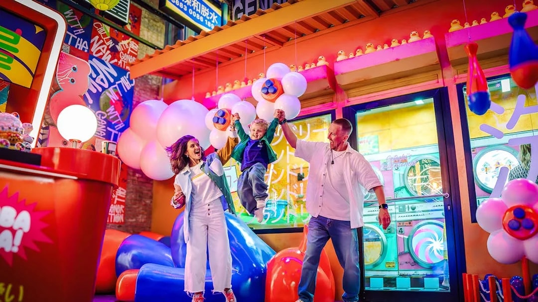 Family enjoying vibrant House of Hype attraction in Dubai.