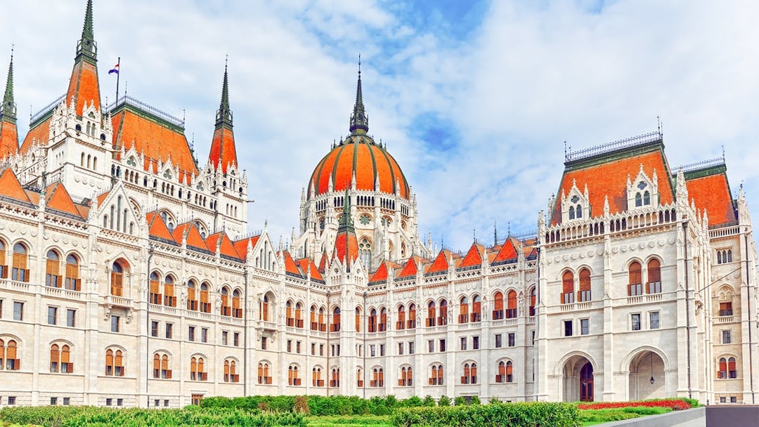 Hungarian Parliament courtyard with red roofs and dome, Budapest.