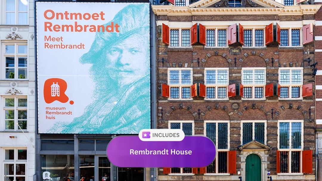 Rembrandt House Museum exterior with red shutters and promotional banner in Amsterdam.