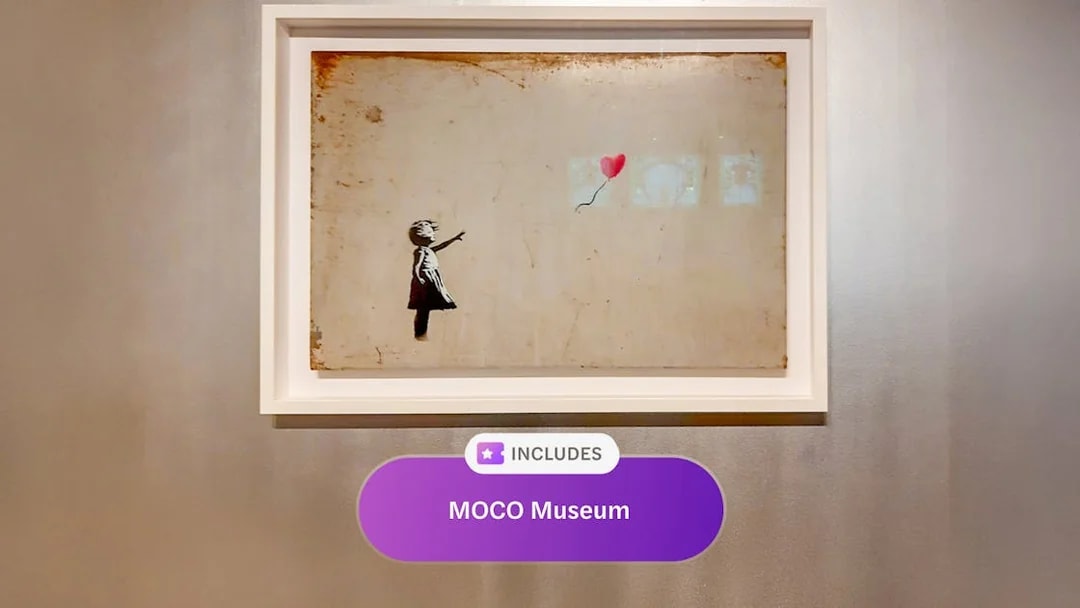 Artwork of a child with a balloon at MOCO Museum, Amsterdam.